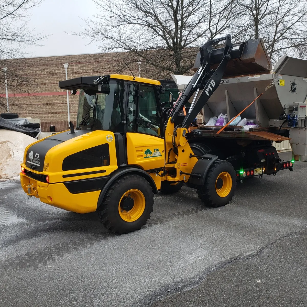 PTB loader with salt spreader for commercial snow removal