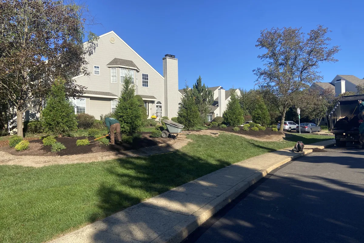 PTB crew mulching landscape beds at a property in Somerset County NJ